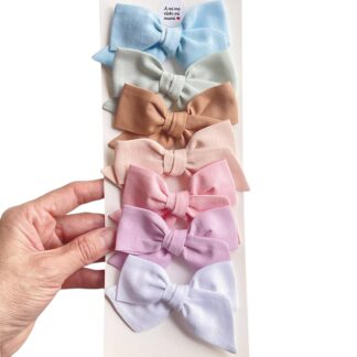 Set oferta de 7 moñitos de color pastel con pinza